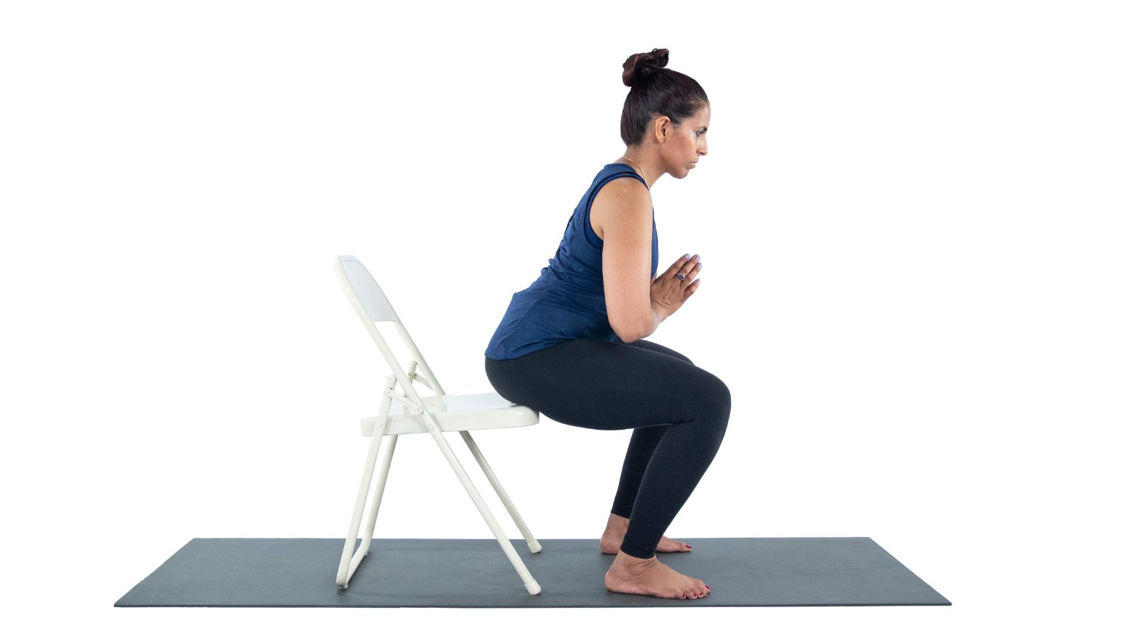 How to use yoga props properly in version of Garland Pose (Malasana) with chair