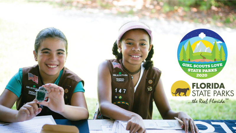 Two Girl Scouts doing Junior Ranger activities.  Includes superimposed Girl Scouts Love State Parks and Florida State Park logos